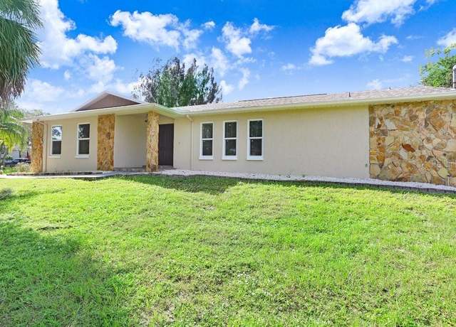 Property at 701 Madison St SW, Ruskin, FL 33570, 3 beds, 2.5 baths