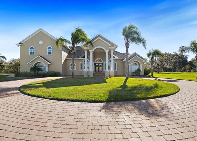 Property at 11518 Hammock Oaks Ct, Lithia, FL 33547, 4 beds, 5 baths