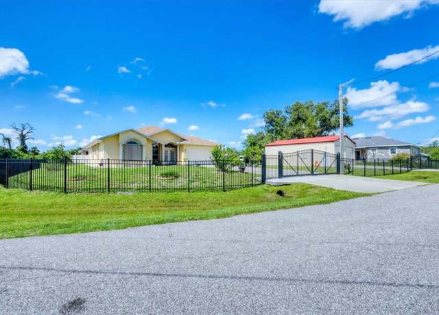 Property at 102 Bayamo Dr, North Port, FL 34287, 4 beds, 3 baths