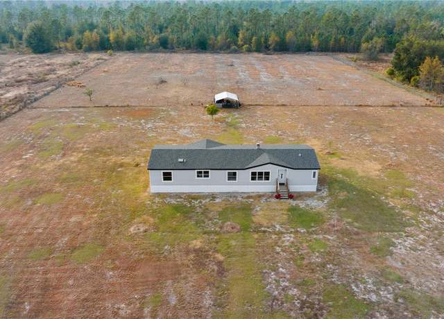 Property at 7435 Postal Colony Rd, Clermont, FL 34714, 4 beds, 2 baths