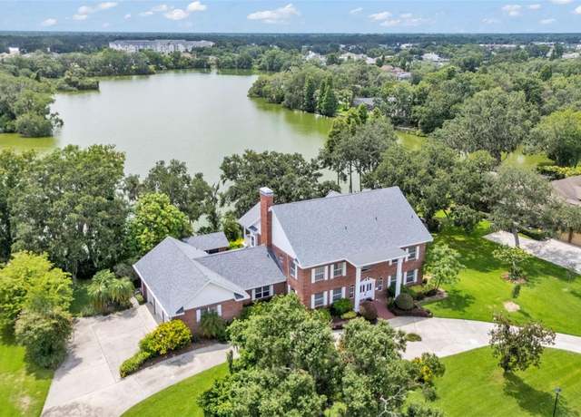 Property at 6948 Hayter Dr, Lakeland, FL 33813, 4 beds, 5.5 baths