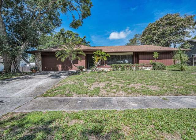 Property at 3040 Enisglen Dr, Palm Harbor, FL 34683, 4 beds, 2 baths
