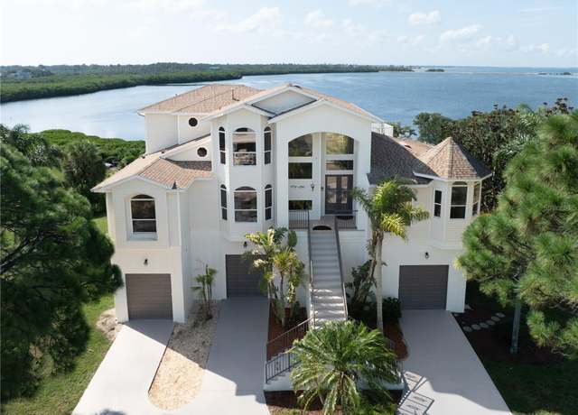 Property at 1661 Sea Breeze Dr, Tarpon Springs, FL 34689, 5 beds, 4 baths