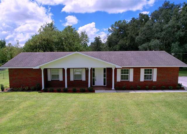 Property at 1405 Knights Griffin Rd, Plant City, FL 33565, 4 beds, 3 baths