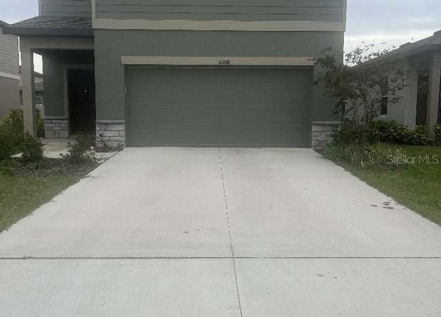 Property at 10448 Ladybug Cv, Parrish, FL 34219, 5 beds, 4 baths