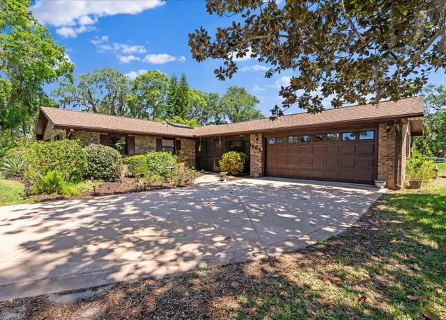 Property at 1905 Pine Tree Dr, Edgewater, FL 32141, 4 beds, 2 baths
