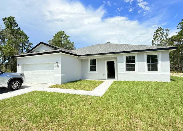 Property at 6926 N Elkcam Blvd, Citrus Springs, FL 34433, 4 beds, 3 baths