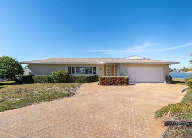 Property at 495 Bath Club Blvd N, North Redington Beach, FL 33708, 3 beds, 2 baths