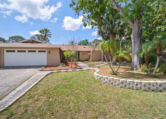 Property at 7020 Oakview Cir, Tampa, FL 33634, 4 beds, 2 baths
