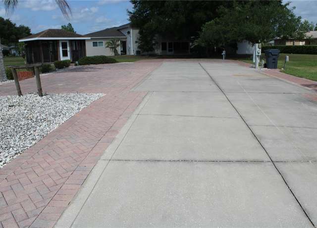 Property at 1074 Caravan Loop, Polk City, FL 33868