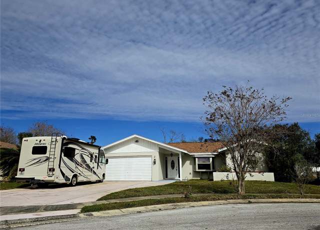 Property at 7129 Beachdale Ct, Port Richey, FL 34668, 4 beds, 2 baths
