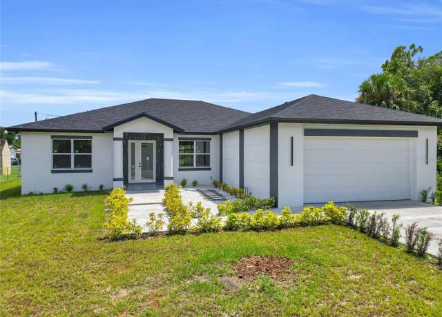 Property at 535 Azalea Ave NW, Port Charlotte, FL 33952, 4 beds, 2 baths