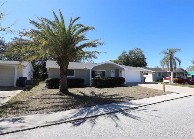 Property at 7144 Fairfax Dr, Port Richey, FL 34668, 4 beds, 2 baths