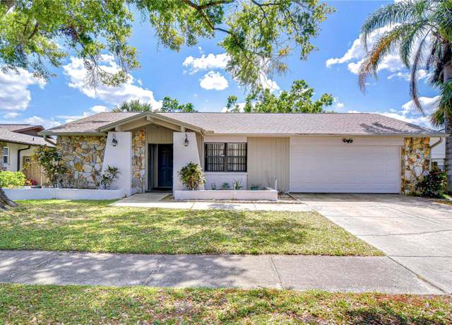 Property at 4110 Summerdale Dr, Tampa, FL 33624, 3 beds, 2 baths