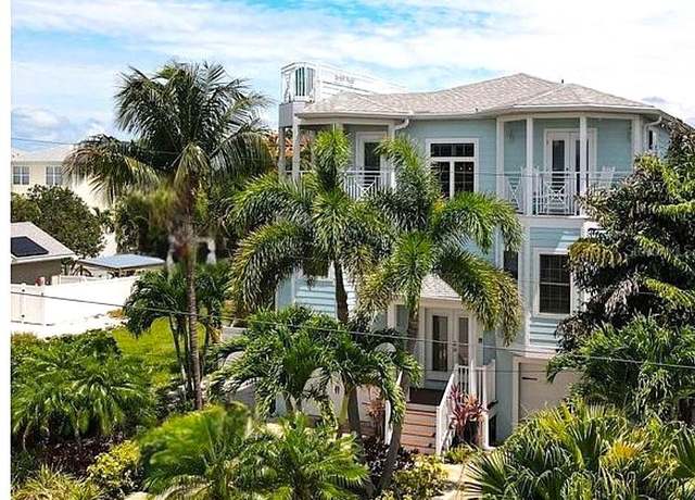 Property at 130 50th St, Holmes Beach, FL 34217, 6 beds, 4.5 baths