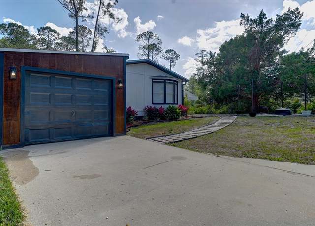 Property at 3669 General Marshall Rd, Daytona Beach, FL 32124, 3 beds, 2 baths
