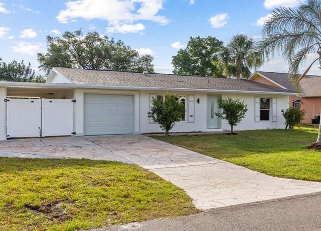 Property at 2070 Carpetgreen St, Port Charlotte, FL 33948, 3 beds, 2.5 baths