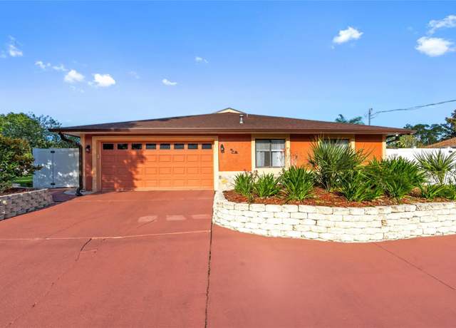 Property at 50 Woodfield Dr, Palm Coast, FL 32164, 4 beds, 2 baths