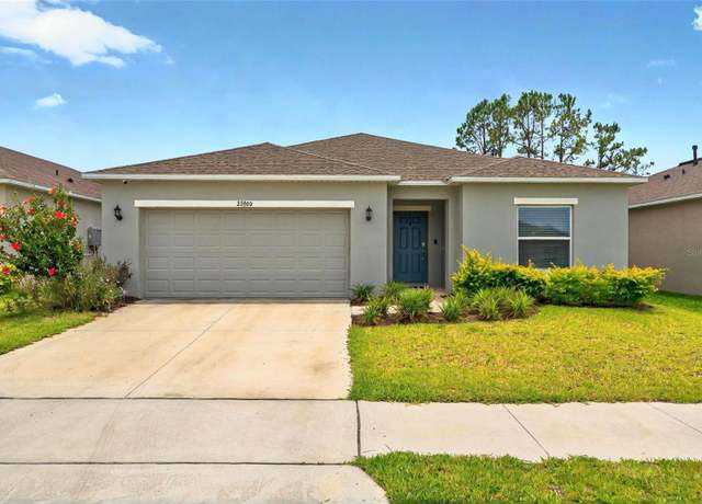 Property at 33960 Sky Blossom Cir, Leesburg, FL 34788, 4 beds, 2 baths