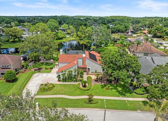 Property at 4118 Carrollwood Village Dr, Tampa, FL 33618, 4 beds, 3 baths