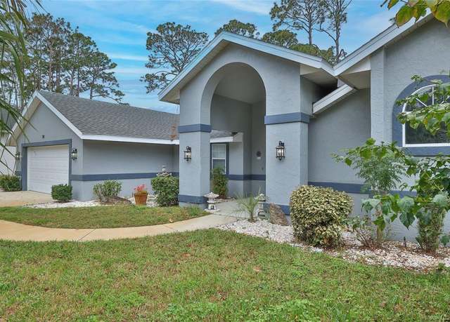 Property at 39 Woodworth Dr, Palm Coast, FL 32164, 4 beds, 3 baths