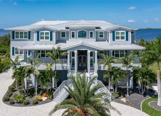 Property at 4601 Grassy Point Blvd, Port Charlotte, FL 33952, 7 beds, 7.5 baths