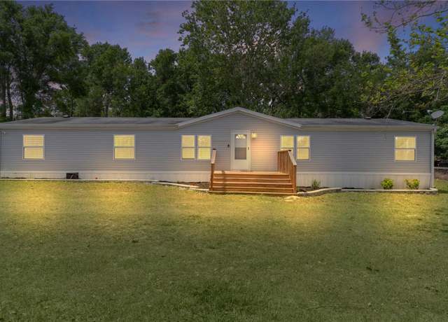 Property at 37403 Rolling Acres Rd, Lady Lake, FL 32159, 4 beds, 2 baths
