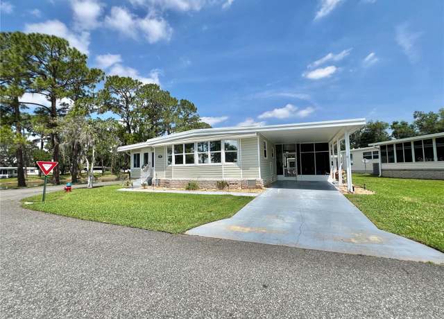 Property at 105 Temple Cv W, Leesburg, FL 34748, 2 beds, 2 baths