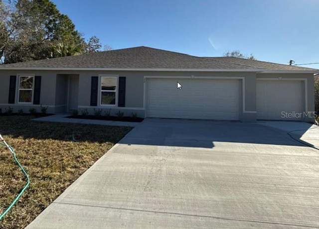 Property at 32 Luther Dr, Palm Coast, FL 32137, 4 beds, 2 baths