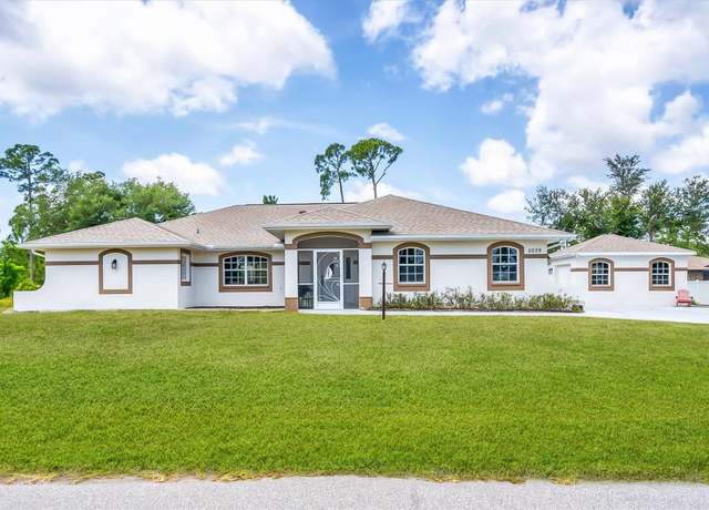 Property at 5039 Parker St, Port Charlotte, FL 33981, 3 beds, 2 baths