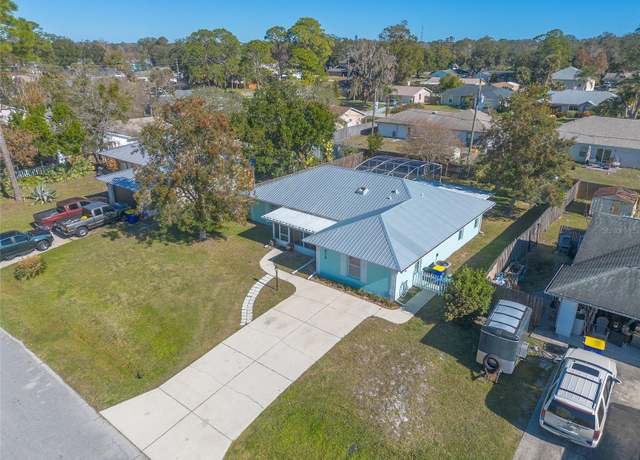 Property at 3015 Queen Palm Dr, Edgewater, FL 32141, 4 beds, 2 baths