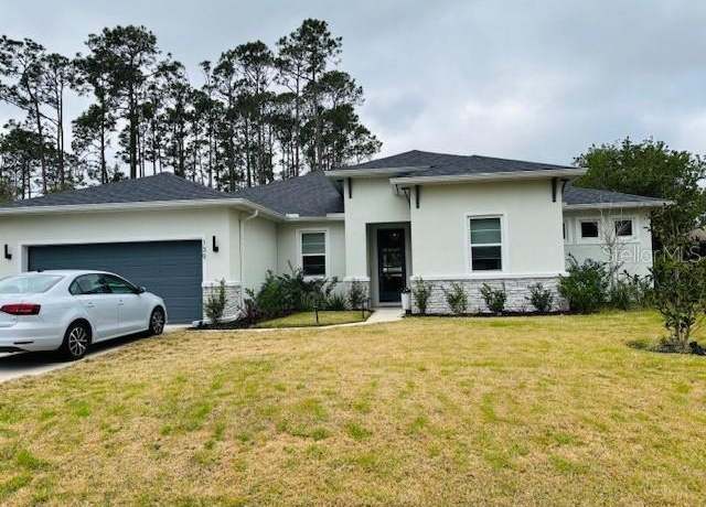 Property at 139 Belleaire Dr, Palm Coast, FL 32137, 4 beds, 3 baths