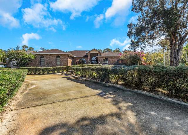 Property at 8700 Cessna Dr, New Port Richey, FL 34654, 4 beds, 3.5 baths