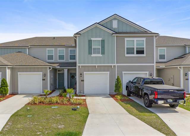 Property at 117 Redbud Rd, Palm Coast, FL 32137, 3 beds, 2.5 baths