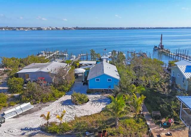 Property at 8888 Bay St, Placida, FL 33946, 2 beds, 2.5 baths