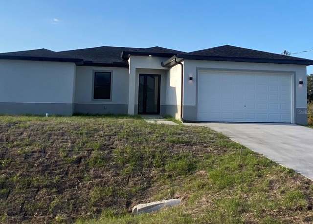 Property at 2614 71st St W, Lehigh Acres, FL 33971, 3 beds, 2 baths