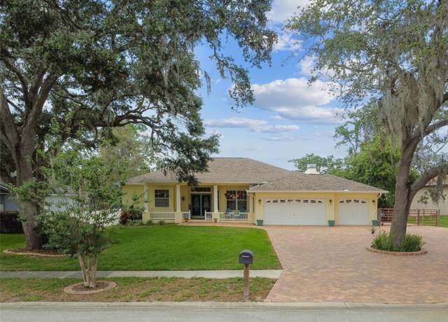 Property at 10306 Shalimar Wood Dr, Thonotosassa, FL 33592, 4 beds, 3 baths