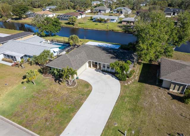 Property at 235 Caddy Rd, Rotonda West, FL 33947, 3 beds, 2 baths