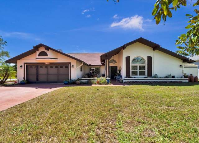 Property at 105 Colechester Ln, Palm Coast, FL 32137, 4 beds, 2.5 baths