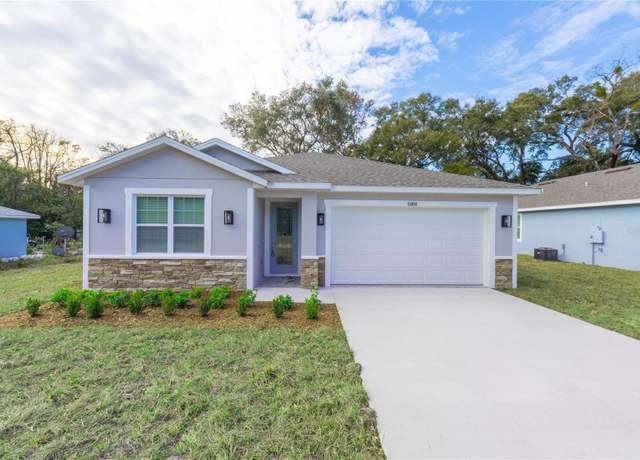 Property at 13850 SE 42nd Ave, Summerfield, FL 34491, 4 beds, 3 baths