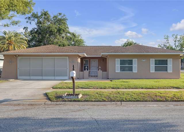 Property at 12817 Lake Tree Ln, Hudson, FL 34669, 3 beds, 2 baths