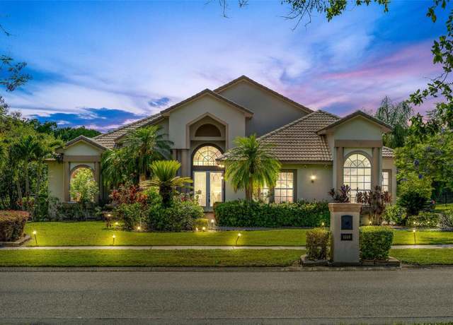 Property at 8550 Lost Cove Dr, Orlando, FL 32819, 4 beds, 3 baths