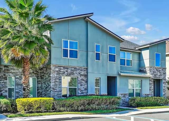 Property at 1552 Carey Palm Cir, Kissimmee, FL 34747, 5 beds, 4.5 baths