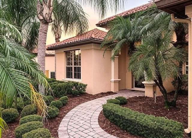 Property at 11660 Delwick Dr, Windermere, FL 34786, 4 beds, 4.5 baths