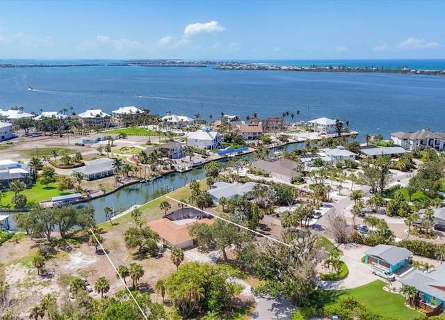 Property at 500 Green Dolphin Dr S, Placida, FL 33946, 4 beds, 3 baths