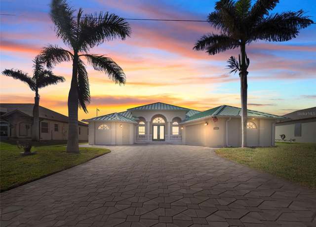 Property at 9567 Honeymoon Dr, Port Charlotte, FL 33981, 3 beds, 2 baths