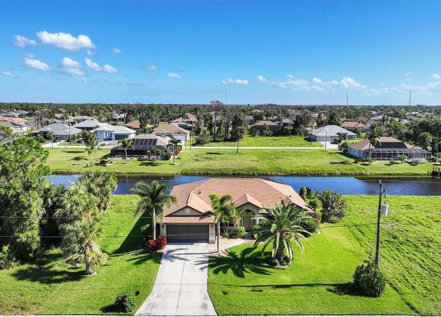Property at 39 Tournament Rd, Rotonda West, FL 33947, 4 beds, 2 baths