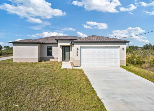 Property at 2618 69th St W, Lehigh Acres, FL 33971, 3 beds, 2 baths