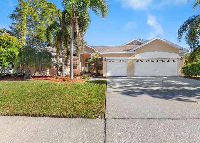 Property at 5211 Karlsburg Pl, Palm Harbor, FL 34685, 4 beds, 3 baths
