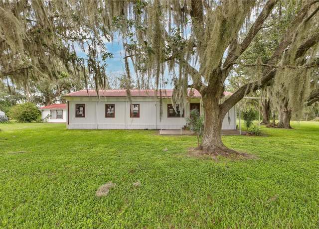 Property at 1205 Grant Bass Rd, Kenansville, FL 34739, 4 beds, 3 baths